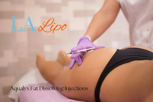 Woman having fat dissolving injections Kensal Town on thighs